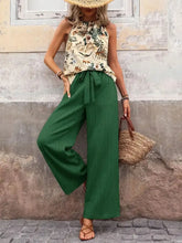 Dark Green Model styling chic summer two-piece outfit pants and top – Voguelle