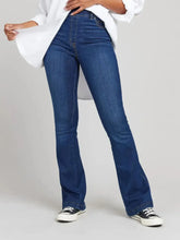 Front view of women’s high-waisted flare jeans in blue denim – Voguelle