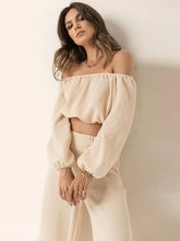 Front view of Full-length look of two-piece Off Shoulder Long Sleeve Top & Pants Set – Voguelle