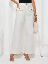 Front view of wide-leg high-waist pants in white on model – Voguelle