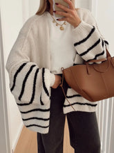 Front view of Striped Open Front Dropped Shoulder Cardigan in white with black stripes – Voguelle