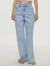 Front view of light blue high waist wide leg jeans on model – Voguelle