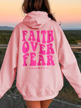 Back angle Faith Over Fear oversized hoodie in pink cotton blend – Voguelle
