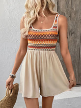 Front view of Wide Strap Casual Romper in beige with multicolor ruched bodice on model – Voguelle
