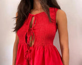 Front view of red tied front smocked top and shorts – Voguelle