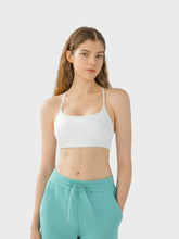 Front view of white crisscross back active cami – Voguelle