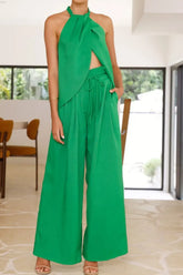 Front view of halter neck wide-leg pants set in green on model – Voguelle