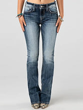 Front view of embroidered washed bootcut jeans in blue – Voguelle