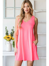 Front view of Sleeveless V-Neck Mini Dress in pink on model – Voguelle