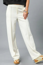 Front view of High Waisted Wide Leg Pants in cream on model – Voguelle