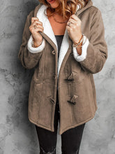 Front view of Sherpa Lined Toggle Hooded Coat in brown on model – Voguelle