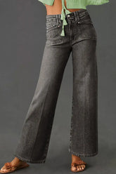 Front view of vintage wash wide leg jeans in black on model – Voguelle