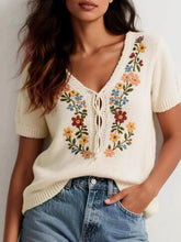 Front view of Embroidered Floral V-Neck Sweater in cream on model – Voguelle