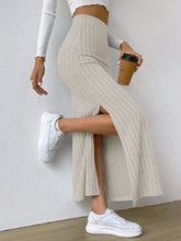 Front side view of Soft Ribbed Knit Maxi Skirt in beige with side slit – Voguelle