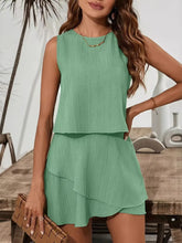 Front view of Sleeveless Top & Layered Skirt Set in green on model – Voguelle