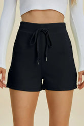 Front view of black plus size scuba drawstring shorts – Voguelle