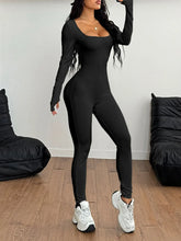 Front view of Square Neck Long Sleeve Active Jumpsuit in black on model – Voguelle