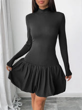 Black mock neck bubble hem dress front view – Voguelle