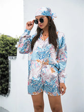 Front view of Printed Button-Up Shirt & Shorts Set in blue on model – Voguelle
