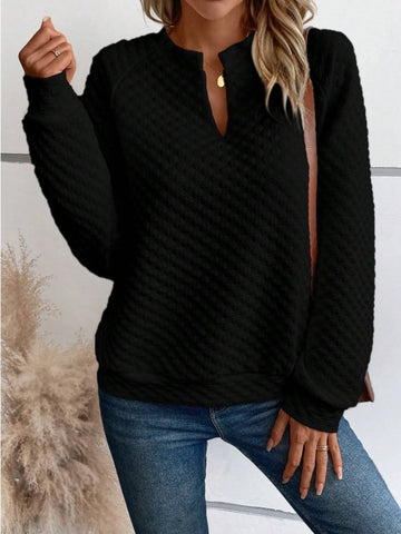 Lifestyle shot of model in white quilted notched sweatshirt – Voguelle