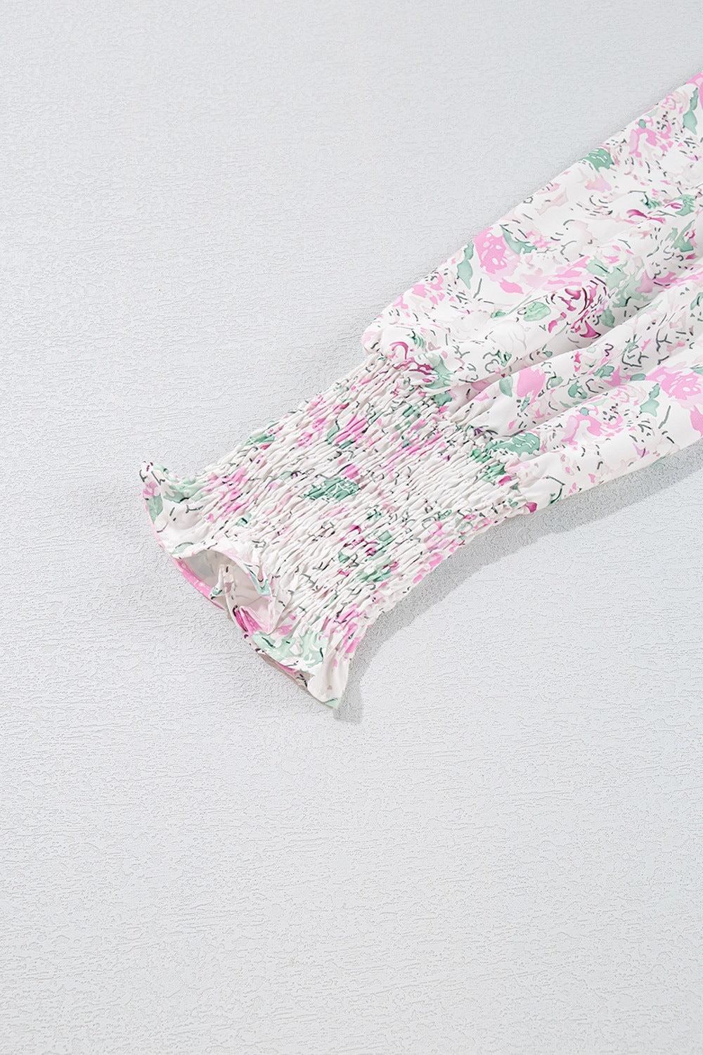 White and pink floral blouse styled with jeans – Voguelle