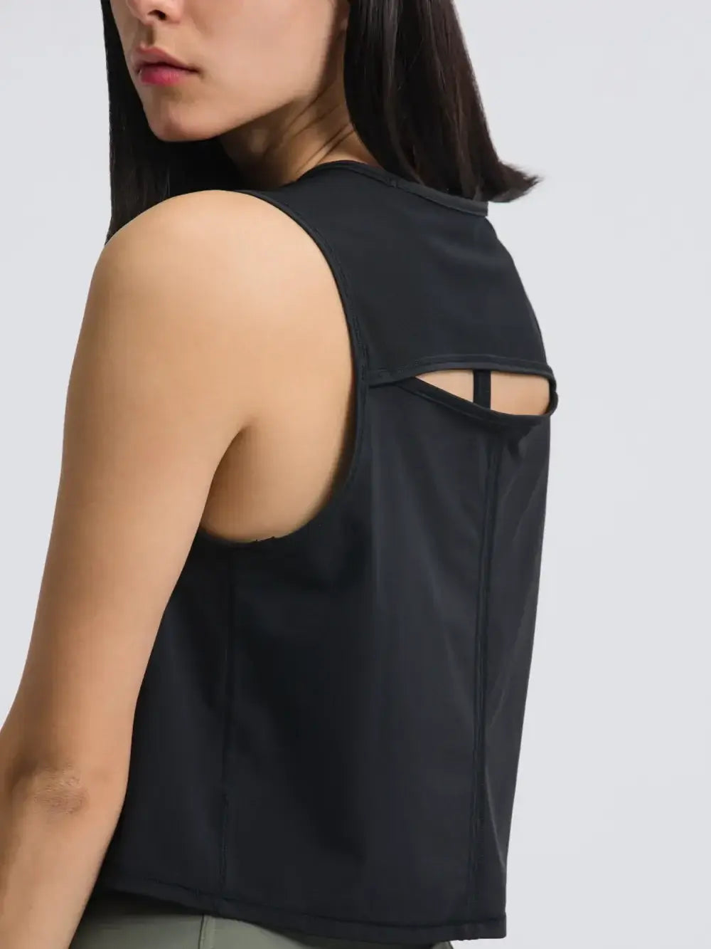 Side angle of Millennia Cropped Active Tank in black – Voguelle