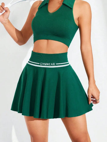 Front view of green ruched high waist mini active skirt on model styled for active sports lifestyle– Voguelle