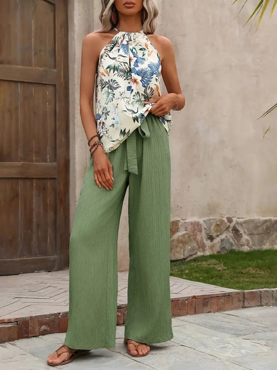 Side pose printed blouse with green wide leg trousers – Voguelle