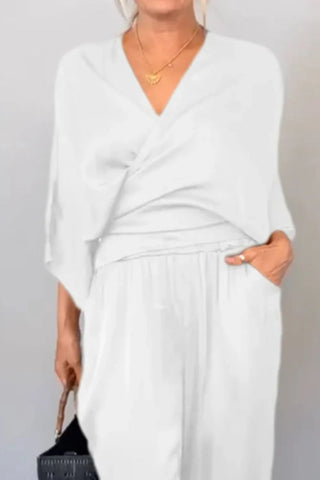 Relaxed fit black wrap jumpsuit with wide legs – Voguelle