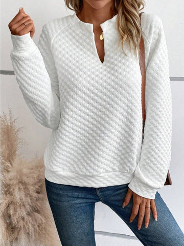 Model wearing quilted white notched neck sweatshirt – Voguelle
