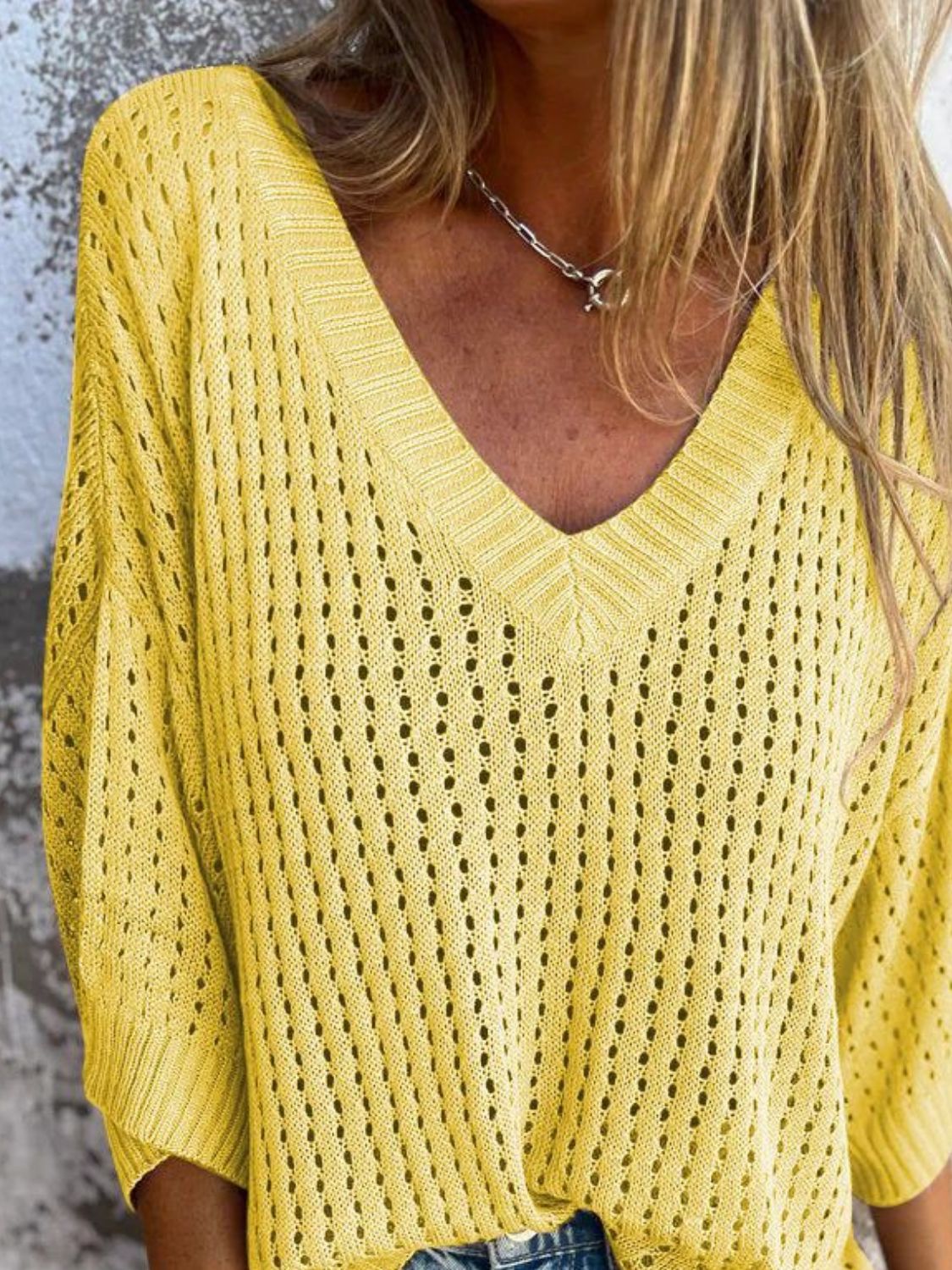 Model in yellow knit cover up top – Voguelle