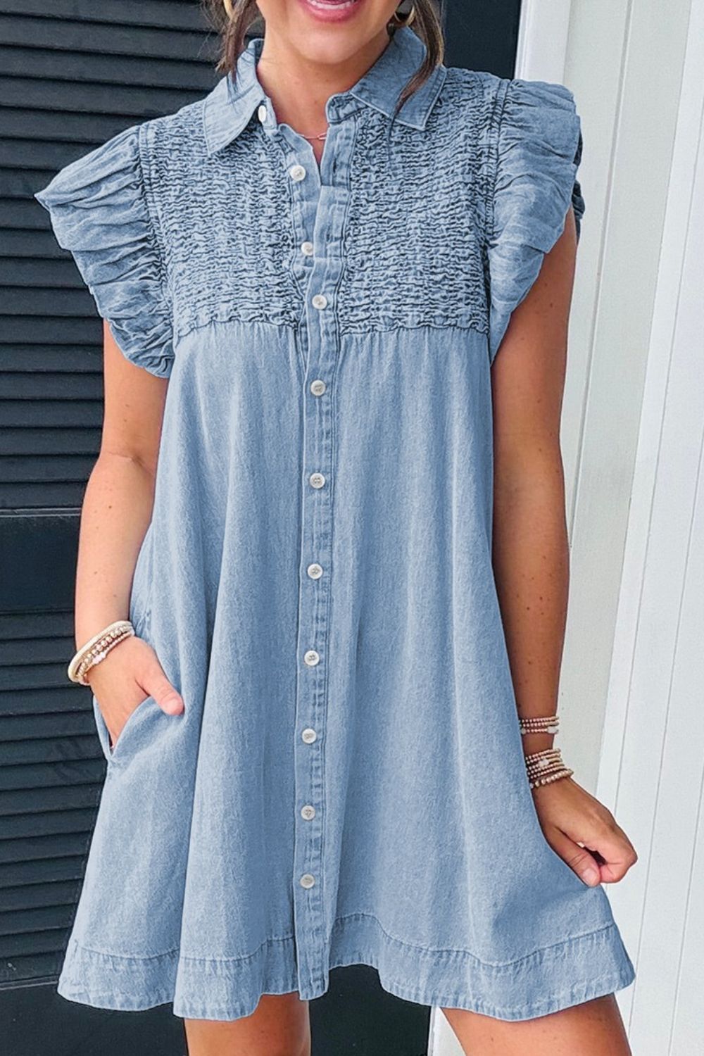 Side angle of button-front denim dress with ruched detail – Voguelle