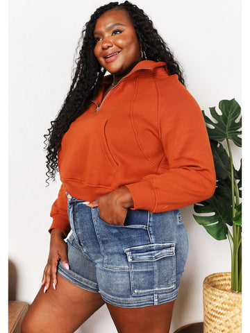 Front pose of model in rust cropped half-zip hoodie – Voguelle