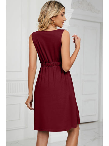 Back detail of buttoned mini dress – Voguelle