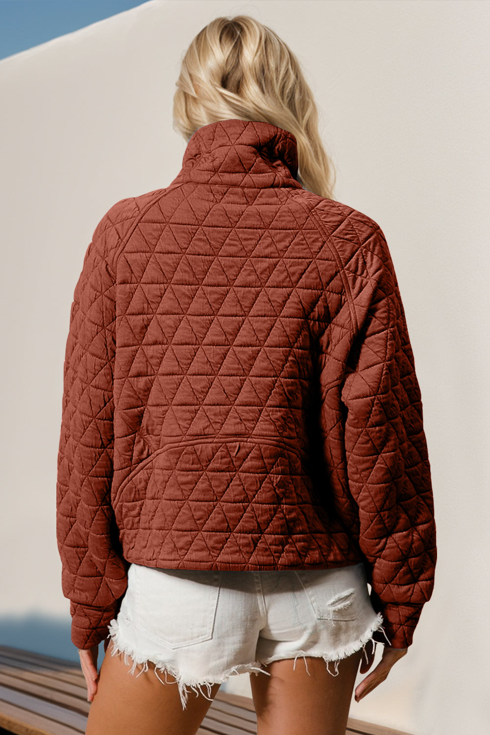 Model styling quilted sweatshirt with white shorts – Voguelle
