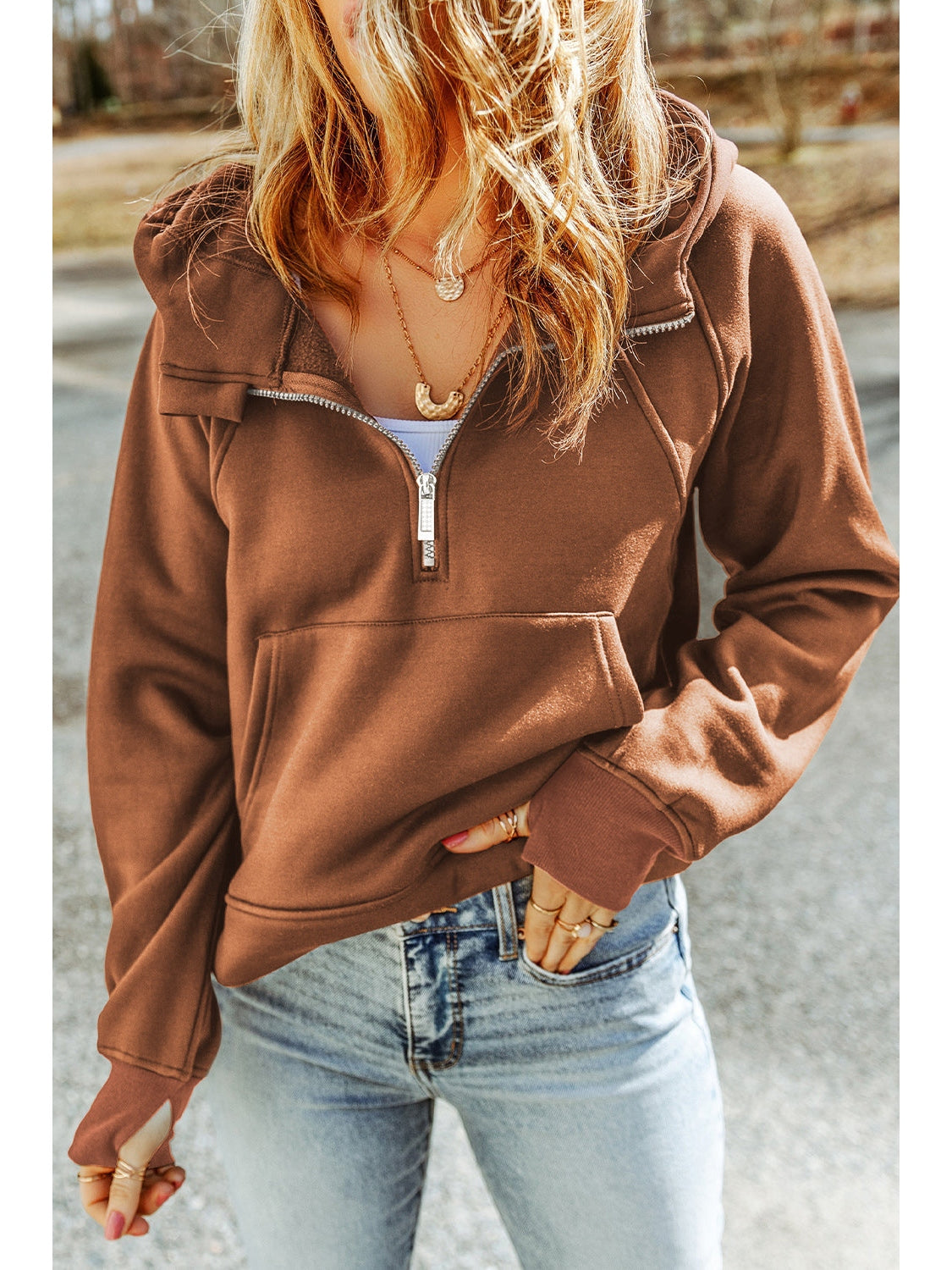 Front view of half-zip pink hoodie with kangaroo pocket on model – Voguelle