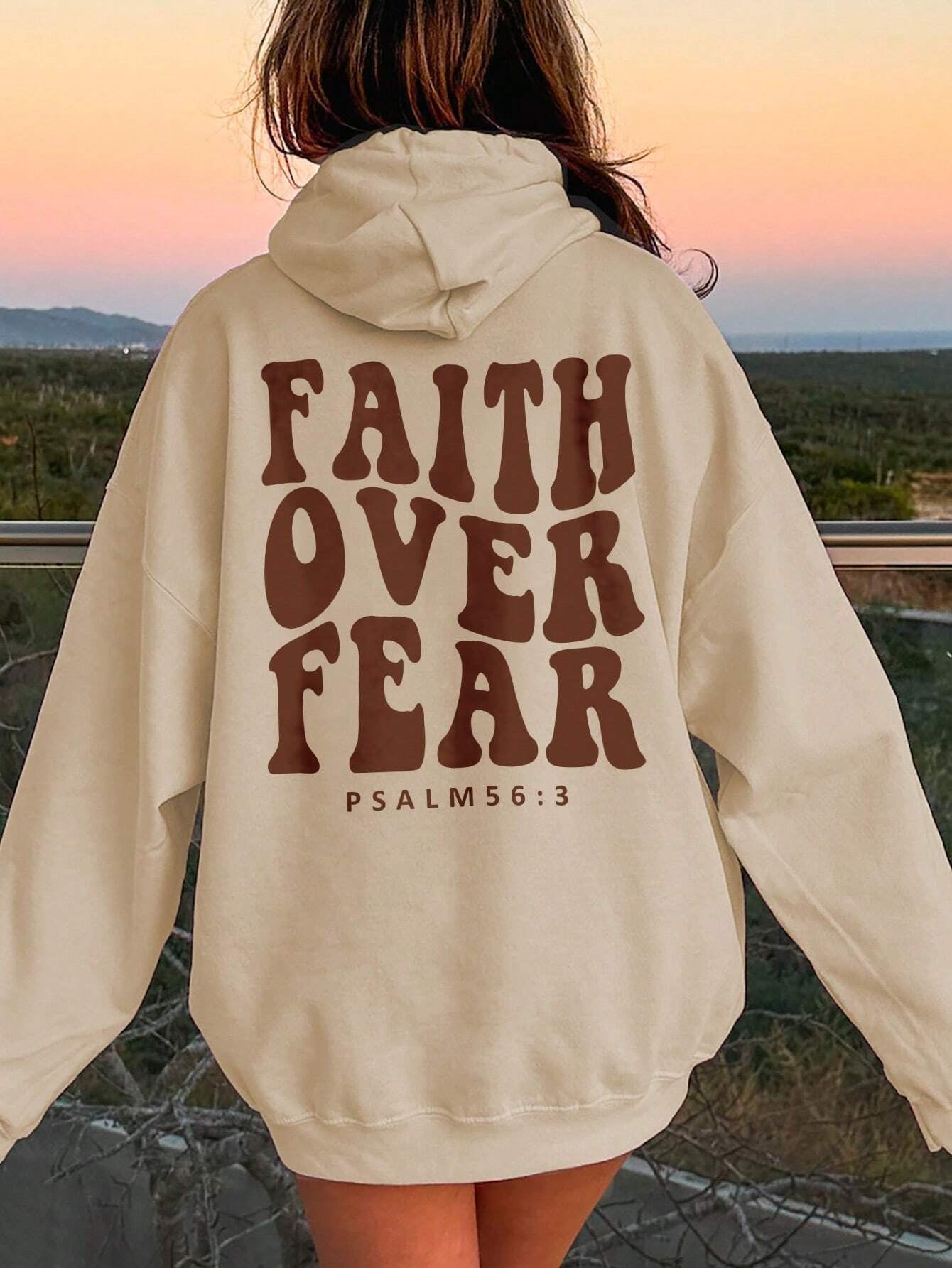 Graphic detail of Faith Over Fear slogan on oversized hoodie – Voguelle