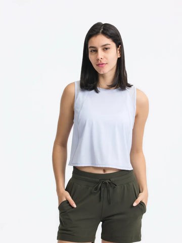 Model wearing Millennia Cropped Active Tank in light yellow – Voguelle