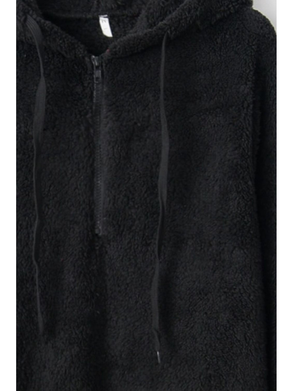 Front view of brown quarter-zip teddy hoodie on model – Voguelle