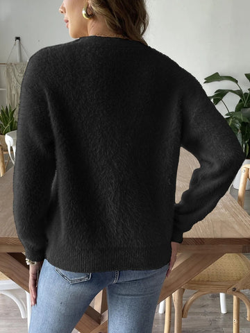 Back view of fuzzy black button-front cardigan – Voguelle