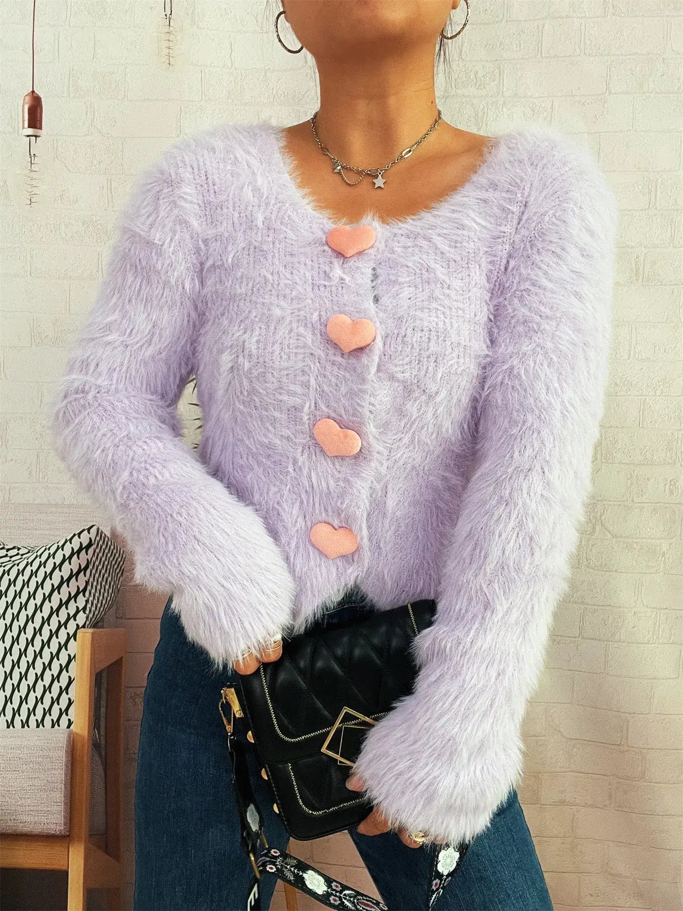Cropped detail of lavender fuzzy cardigan with pink buttons – Voguelle