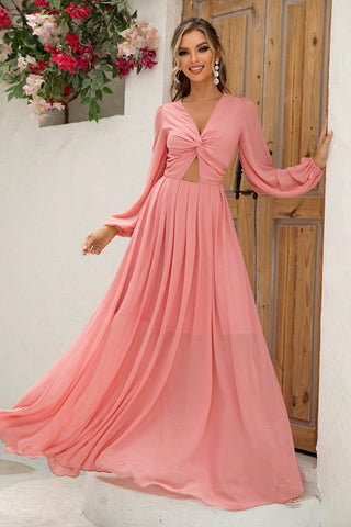 Model wearing royal blue twist front V-neck evening gown – Voguelle