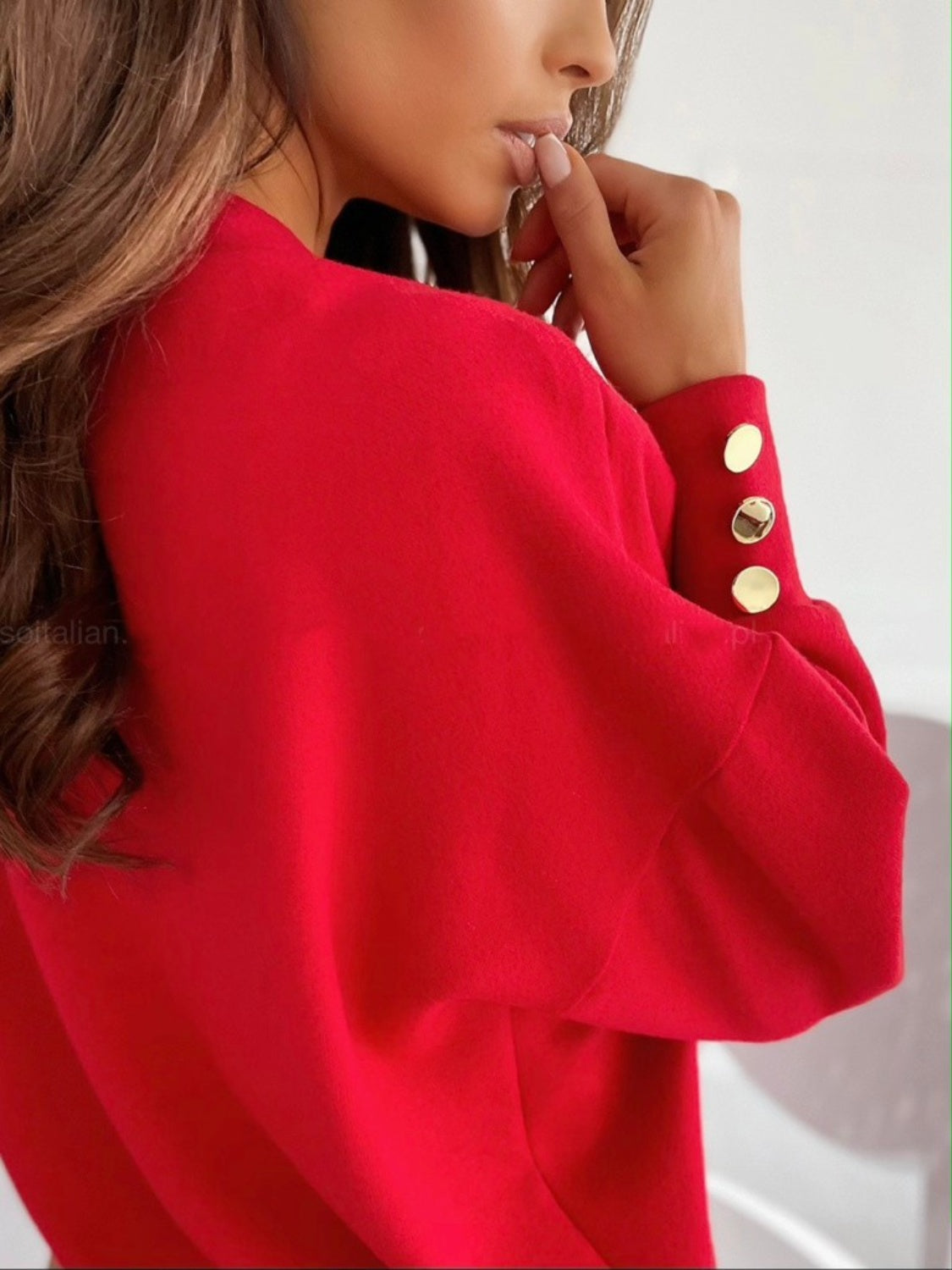 Decorative button cuff detail on blue V-neck sweatshirt – Voguelle