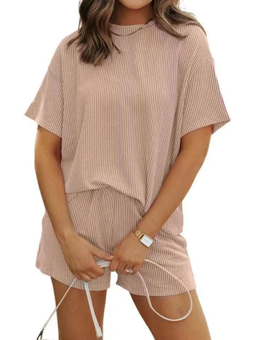 Pink ribbed two-piece set styled with accessories – Voguelle