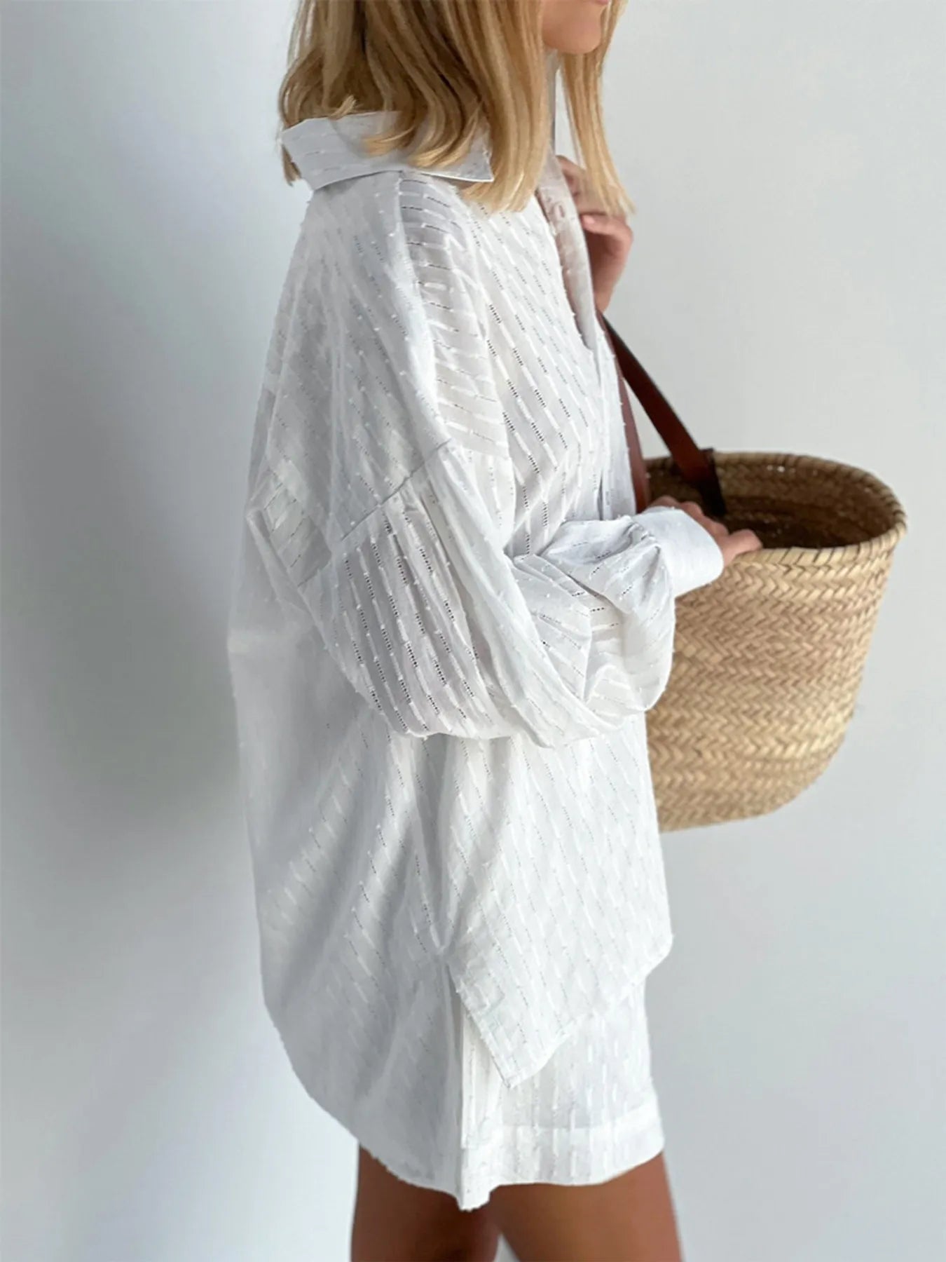Front view of textured marigold button-up shirt and shorts set in white – Voguelle