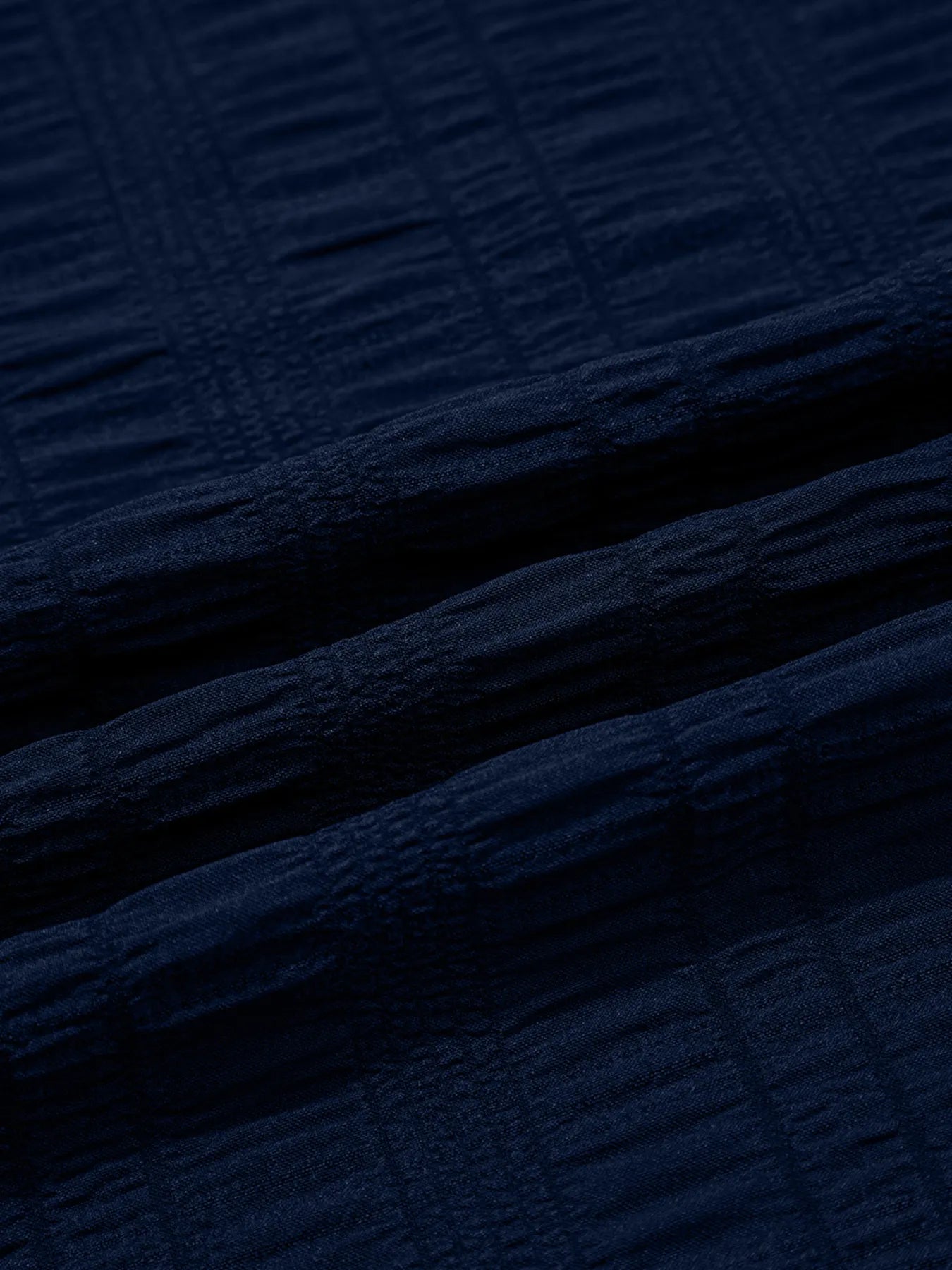 Back detail of shirred waistband on navy high waist shorts – Voguelle