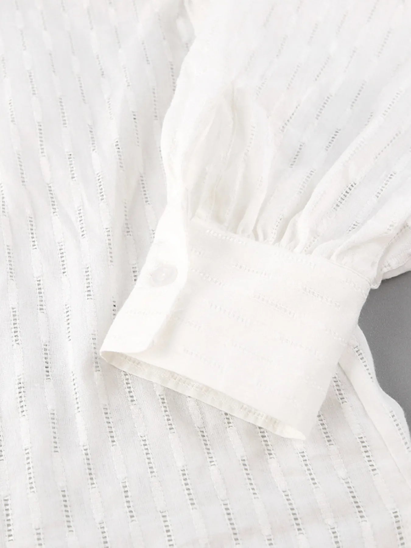 Flat lay of textured marigold two-piece shirt and shorts set – Voguelle