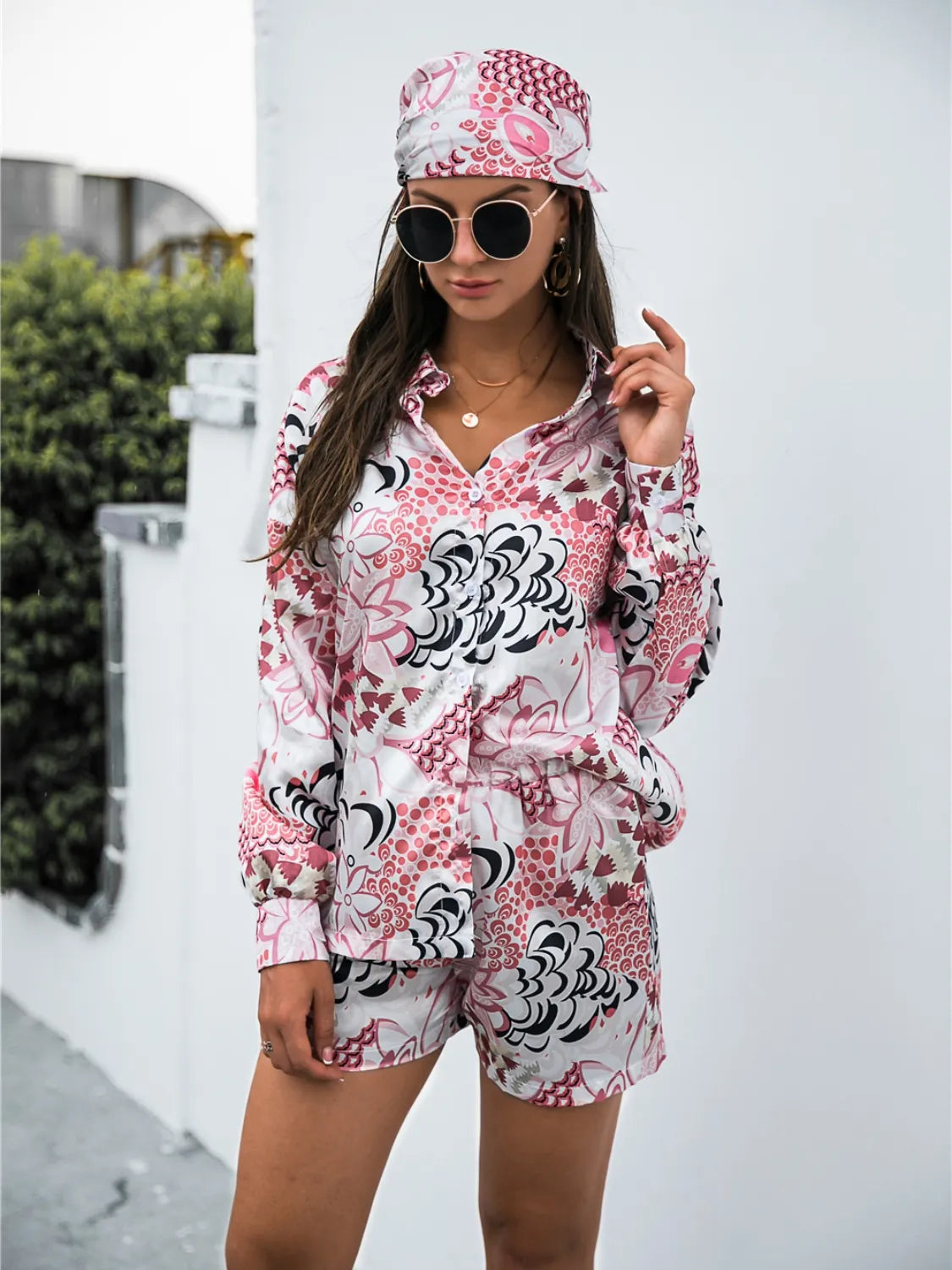 Model wearing pink Printed Shirt & Shorts Set in relaxed pose – Voguelle