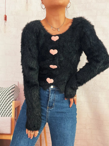 Close-up heart button detail on black fuzzy cardigan – Voguelle