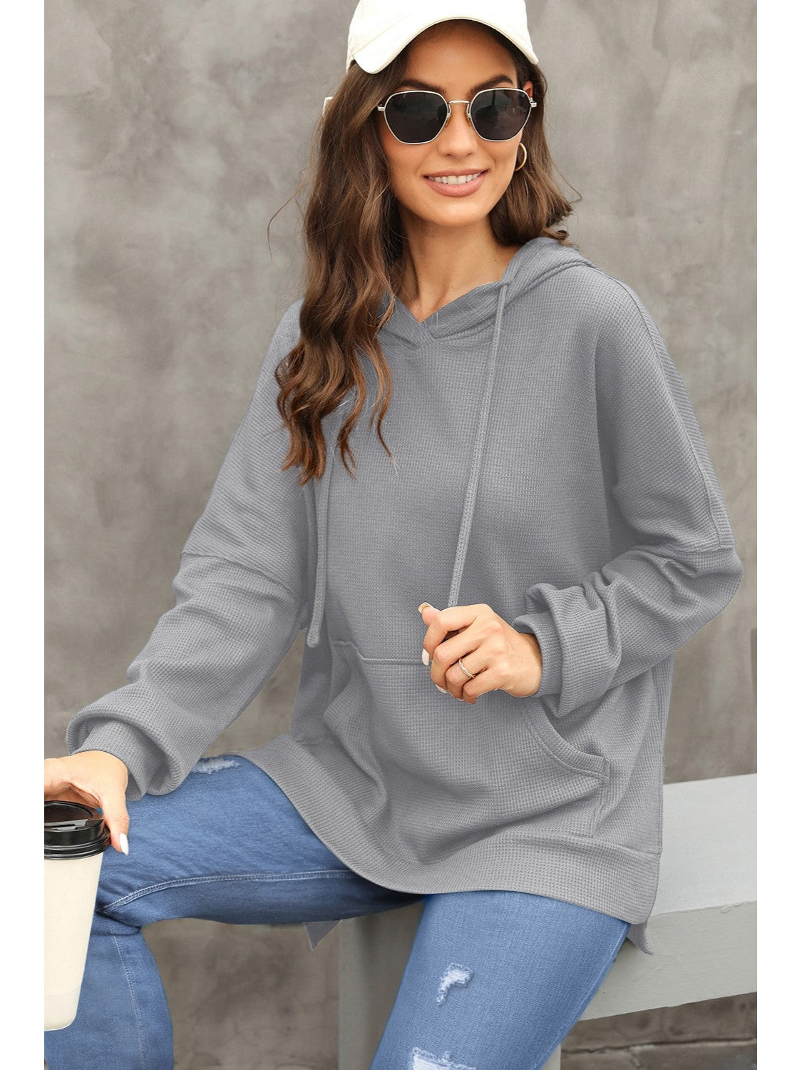 Back view of gray waffle-knit hoodie with relaxed fit – Voguelle